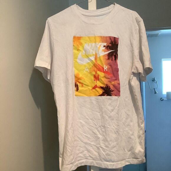 Nike Other - The Nike tee T-shirt graphic designer size medium The company was founded on Jan